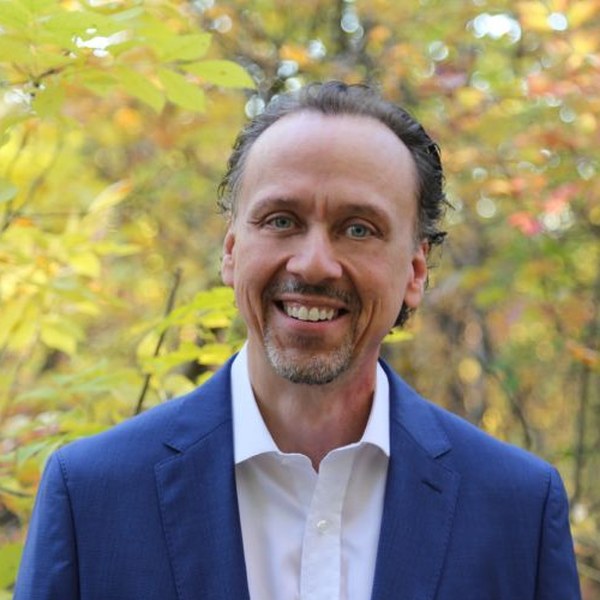 Professional headshot of Ron Cadez